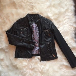 Black faux leather jacket.